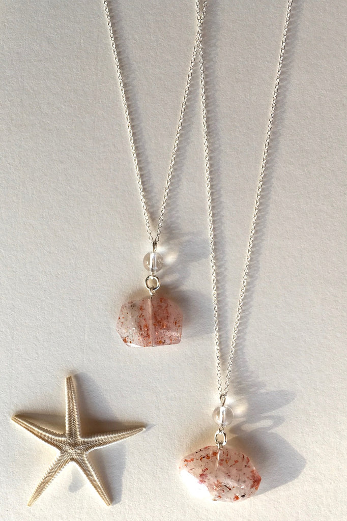 Pendant of Strawberry Quartz with Rock Crystal is unusual stone with flat cut and faceted to reveal all the lovely glittery inclusions hidden inside featuring 2.5cm to 3.5cm long total Each pendant drop.