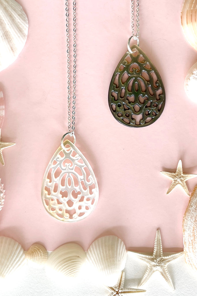 Pendant Cay Caribbean droplet is hand carved from a mother of pearl shell,