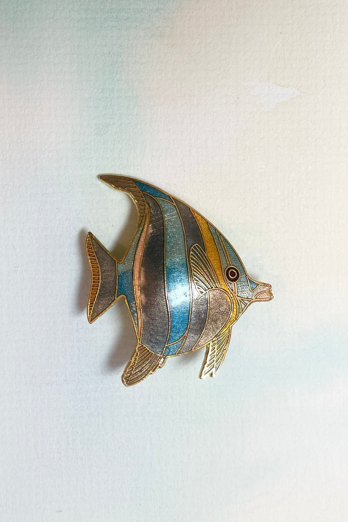 A retro brooch in the form of an Angel Fish, enamelled in soft greys and blues. 