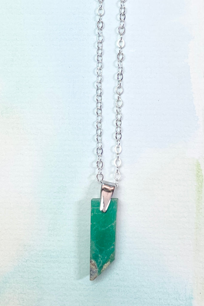 Chrysoprase in the raw, these rugged pendants were cut by a young local lapidarist to give a feel of the power of this gorgeous green stone.