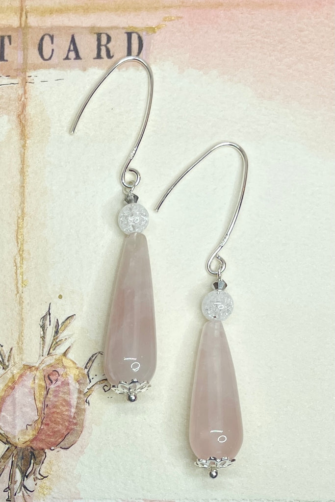 These pale pink romantic teardrop earrings will be attracting only the best vibes and loving energy to you. 