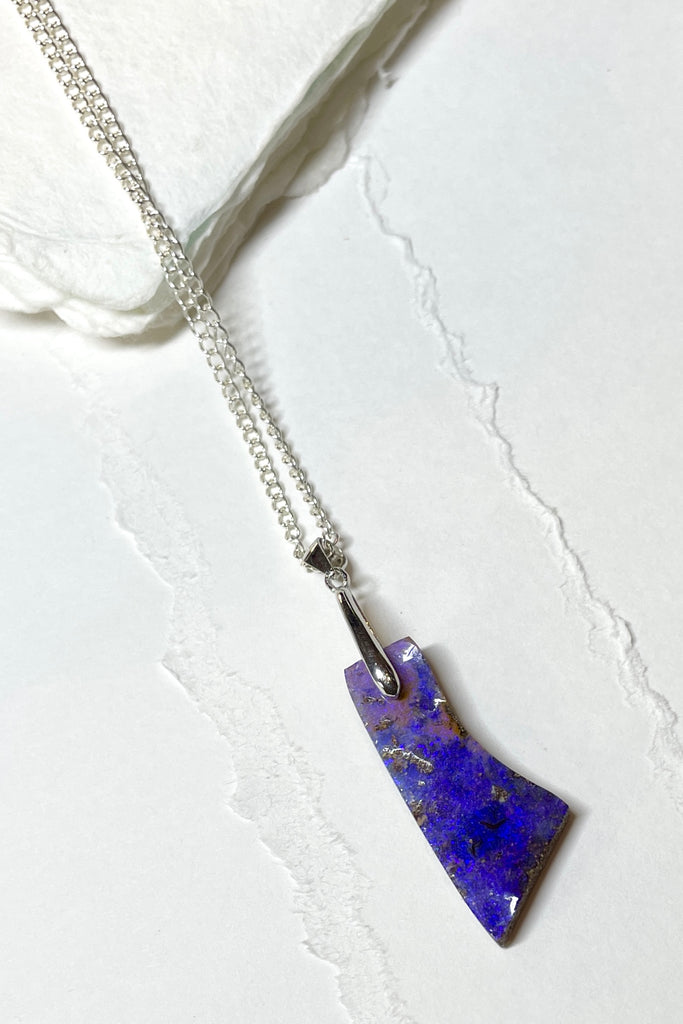 This is a one off piece, a hand cut opal, it shows the mark of the artist who cut and polished the stone. This genuine Australian Opal pendant stone was cut and polished in Australia. 