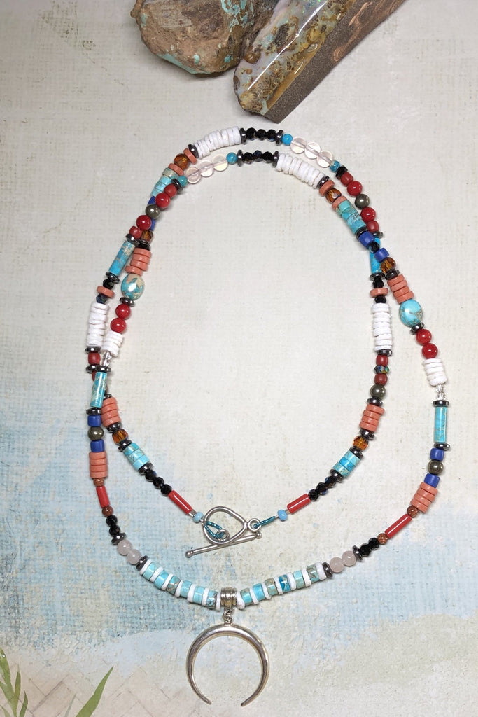 A powerful gemstone necklace with natural stones. Perfect to wear with chic boho luxe clothing an exclusive design