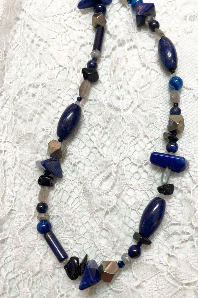 a sweet choker style hand made using an assortment of blue gemstones. These include Lapis Lazuli, Agate, Labradorite and natural Pyrite. 