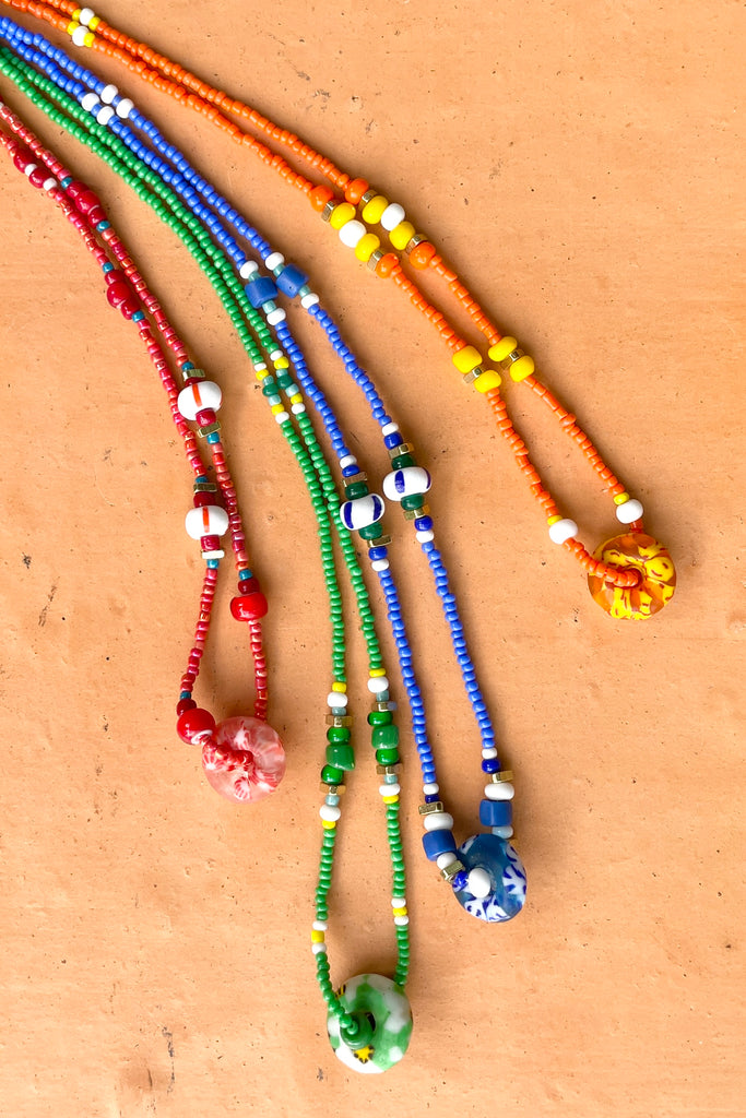 This necklace is from our exclusive range of jewellery highlighting the beautiful African recycled powder glass beads made by the people of Krobo Mountain in Ghana, West Africa.
