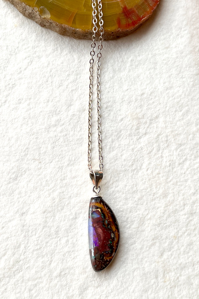 This is a one off piece, a hand cut opal, it shows the mark of the artist who cut and polished the stone. This genuine Australian Opal pendant stone was cut and polished in Australia. There will never be another piece exactly the same, it is unique.