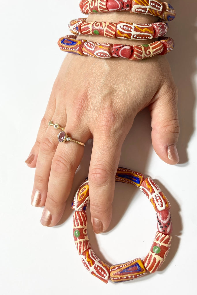 This bracelet was made by combining a unique combination of African Beads. Beads are strung on an elastic cord which will stretch over your wrist or ankle. 
