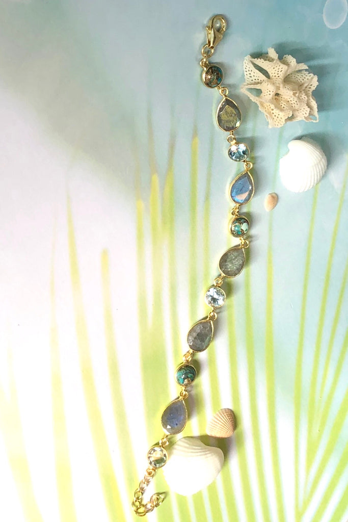 An ultra fine gold vermeil bracelet dotted with London blue Topaz, Labradorite and Turquoise composite.  
