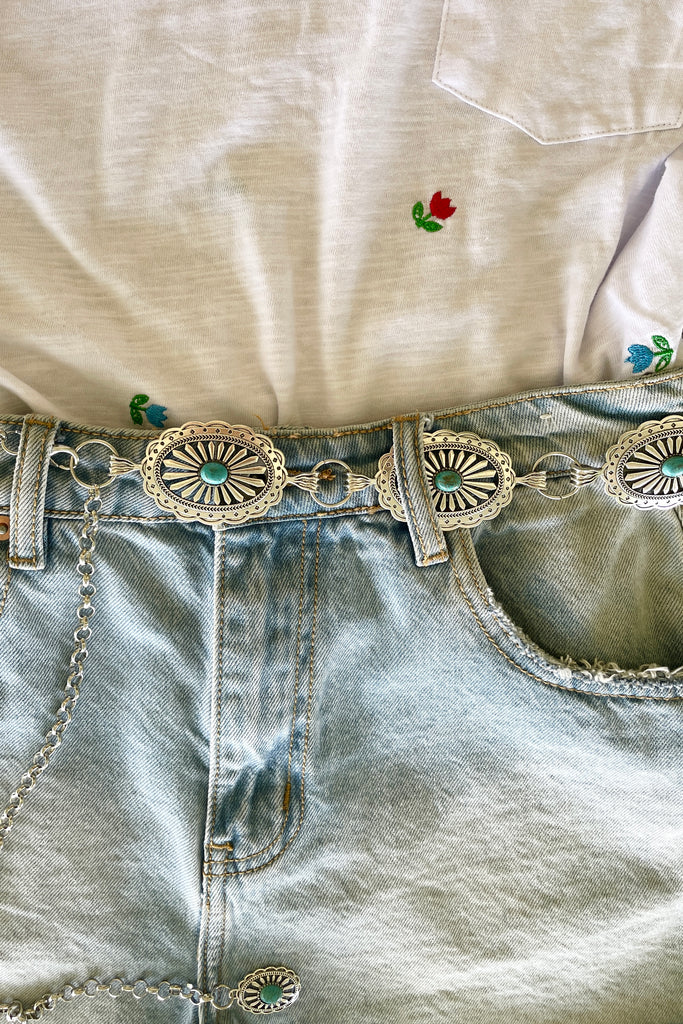 Santa Fe style Conch belt with Turquoise is sure to be one for the bohemian cowgirl