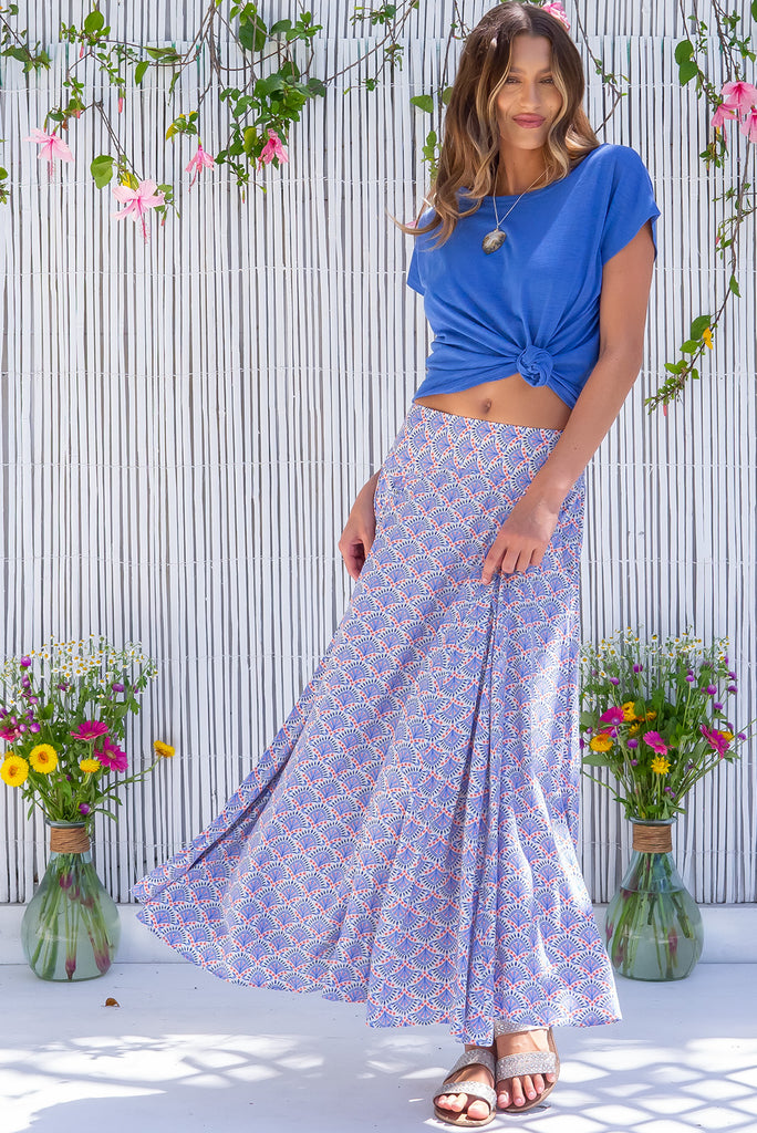 The Atlantis Blue Fan Maxi Skirt is a beautiful cream based skirt with a blue fan motif print. The skirt features a double v-shaped waist yoke, inset panels on the front from the yoke down, very full skirt, elasticated back of waist and side pockets. This is a slip on design with a shapely hemline and slightly longer front due to the inset panels. Made from 100% Viscose.