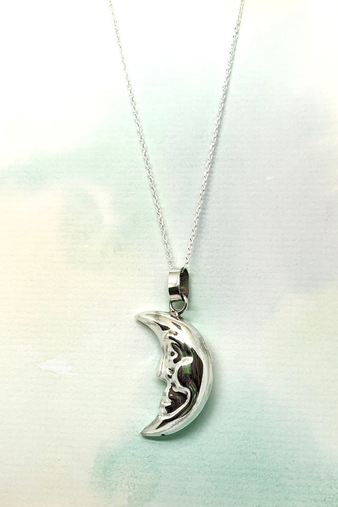 This Echo Man in the Moon Pendant is a vintage 925 silver pendant featuring a faced moon.