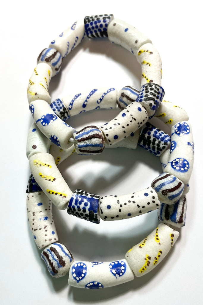 This bracelet was made by combining a unique combination of African Beads. Beads are strung on an elastic cord which will stretch over your wrist or ankle. 