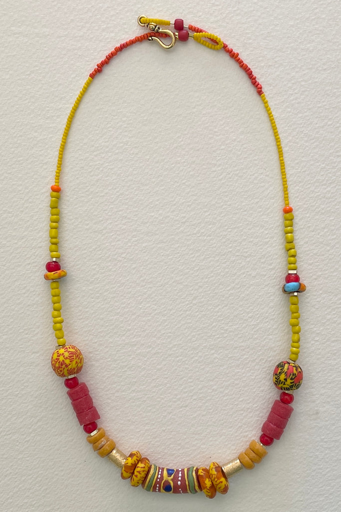 necklace is from our exclusive range of jewellery highlighting the beautiful African recycled powder glass beads made by the people of Krobo Mountain in Ghana