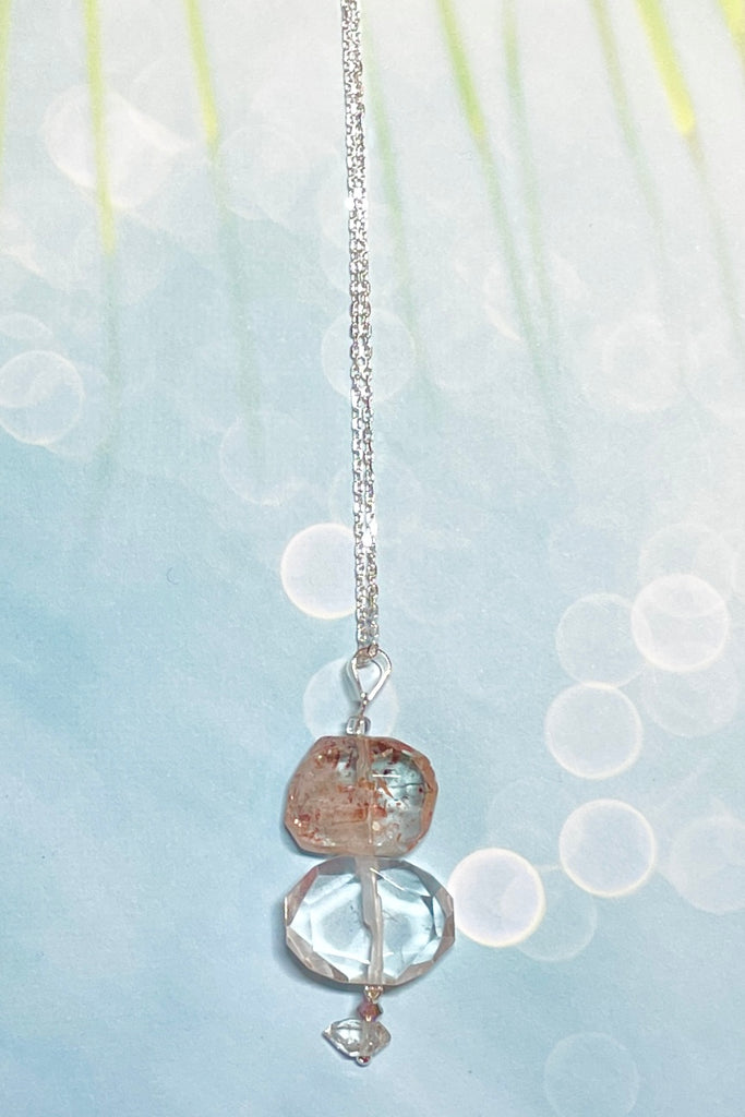 A pretty pendant of Strawberry Quartz that has been flat cut and faceted to reveal all the lovely glittery inclusions hidden inside.