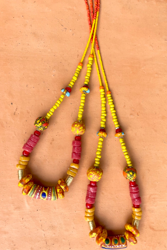 necklace is from our exclusive range of jewellery highlighting the beautiful African recycled powder glass beads made by the people of Krobo Mountain in Ghana