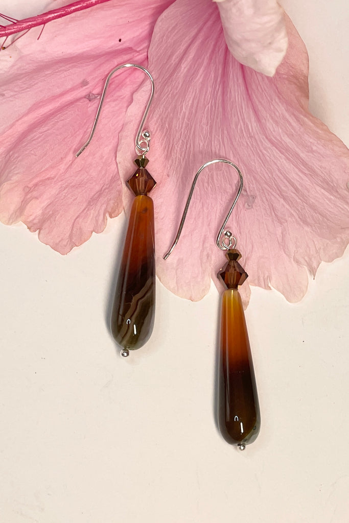 Teardrop style earrings are in coloured agate stone