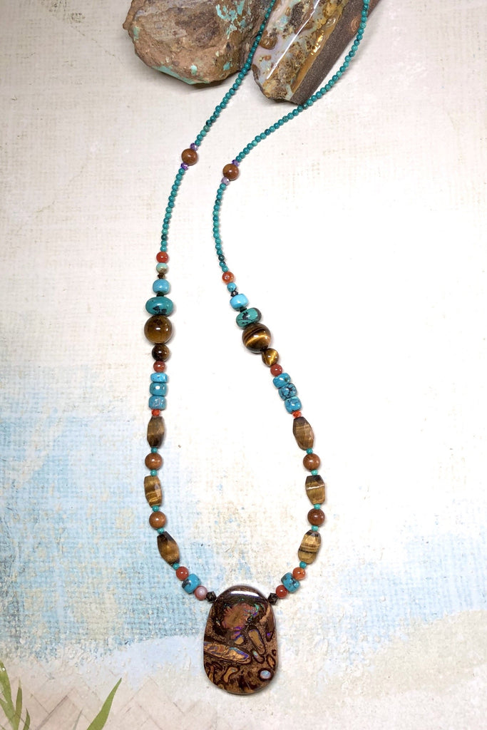 A powerful gemstone necklace with natural stones. Perfect to wear with chic boho luxe clothing an exclusive design