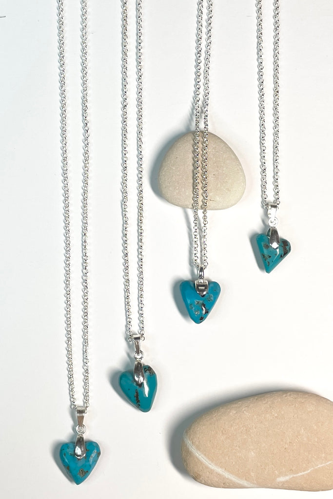 This lovely old turquoise pendant is a one off piece, hand carved into a rough heart shape 