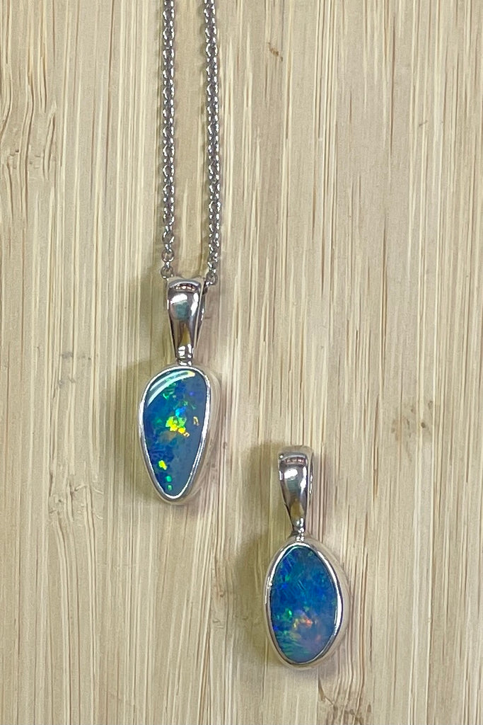 The Australian opal pendant is shaped into a small round oval shape, very dainty.