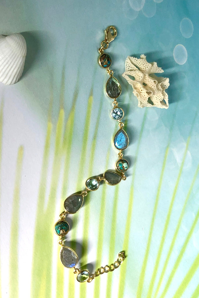An ultra fine gold vermeil bracelet dotted with London blue Topaz, Labradorite and Turquoise composite.  