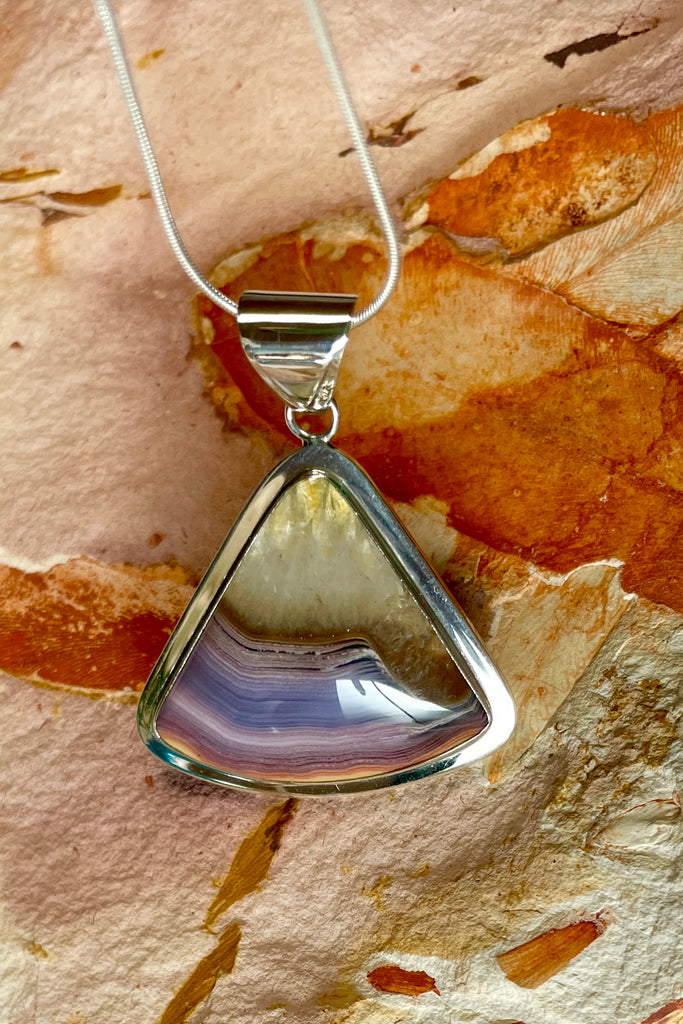 A modernist setting in an exclusive design, the Mexican Agate stone was cut and polished by a local Sunshine Coast stone artist