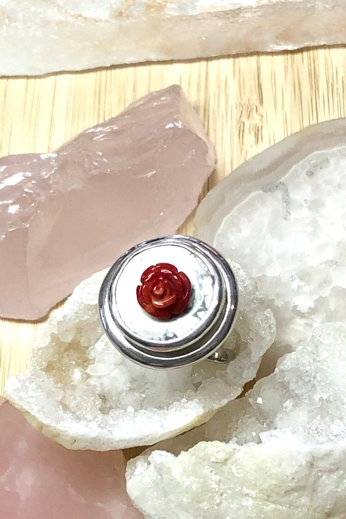 Echo Ring Red Rose in 925 Silver is most unusual ring featuring a white and grey marbled base stone with a carved coral rose as the centrepiece.