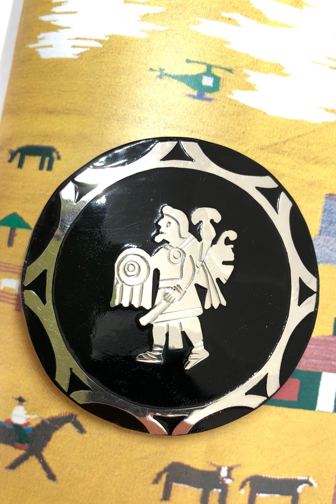 brooch will add some Mexican mythology to your wardrobe. Handmade with silver warrior figure on the front and silver back.