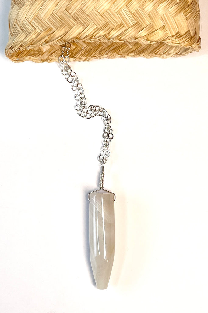 This pendant is a lovely piece of slightly transparent white Agate stone that has been cut and polished by ROAM Ladies Lapidary Collective in Sakaraha, Madagascar. 