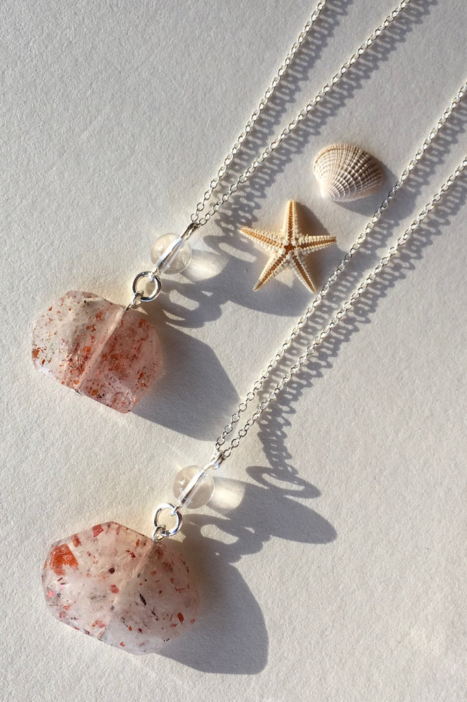Pendant of Strawberry Quartz with Rock Crystal is unusual stone with flat cut and faceted to reveal all the lovely glittery inclusions hidden inside featuring 2.5cm to 3.5cm long total Each pendant drop.