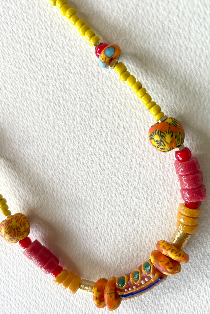 necklace is from our exclusive range of jewellery highlighting the beautiful African recycled powder glass beads made by the people of Krobo Mountain in Ghana