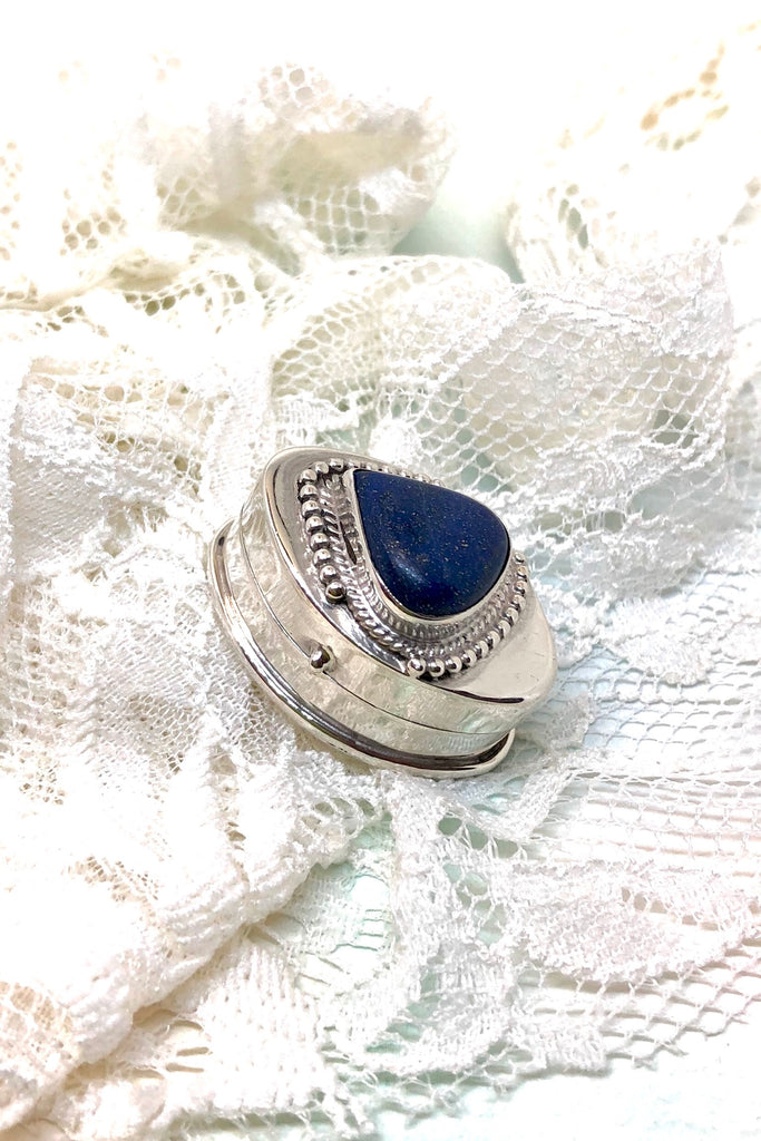Echo Silver Box Lapis Lazuli inlaid Lid is a silver pill box inlaid with a triangular cabachon of Lapis Lazuli on the lid.