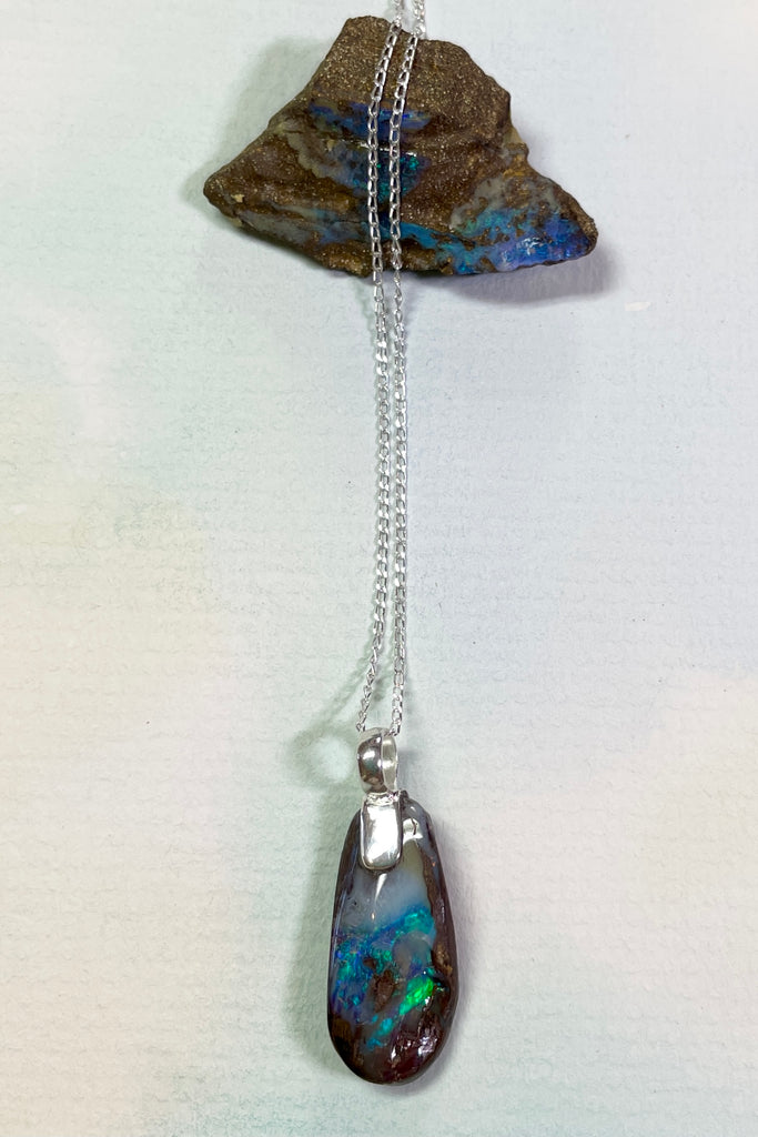 Australian Opal is from Winton, this intriguing piece of Boulder Opal was mined, cut and polished in Queensland.