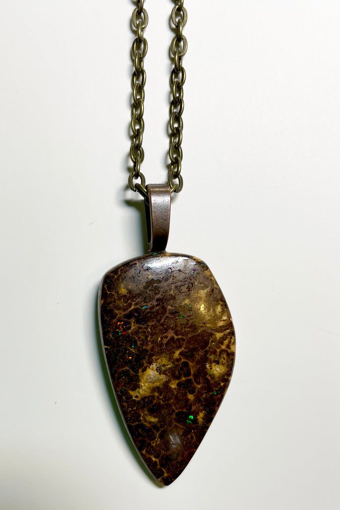This piece of Australian Opal is from Winton, piece of Boulder Opal was mined, cut and polished in Queensland.