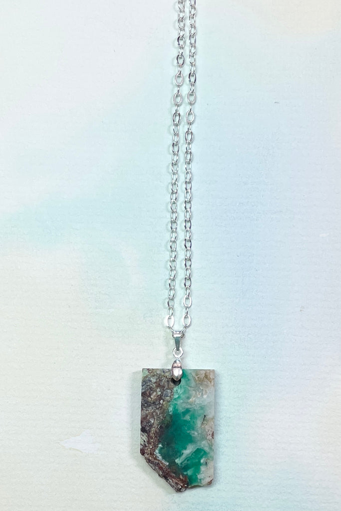 Chrysoprase in the raw, these rugged pendants were cut by a young local lapidarist to give a feel of the power of this gorgeous green stone.