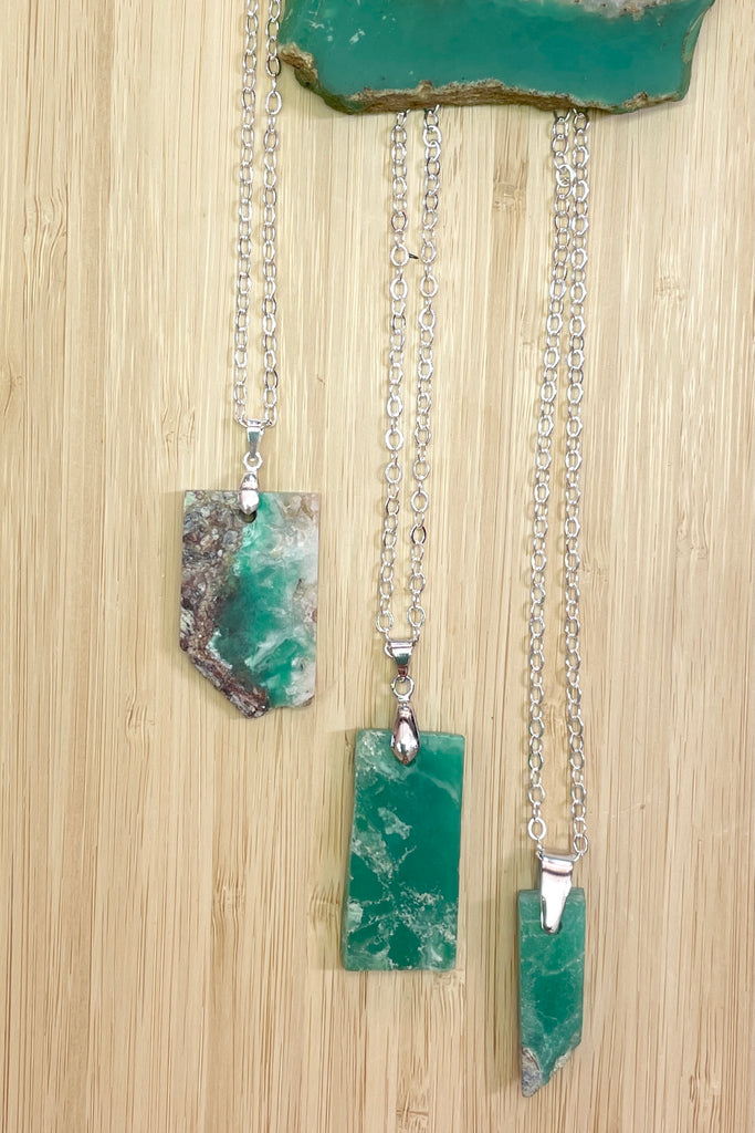 Chrysoprase in the raw, these rugged pendants were cut by a young local lapidarist to give a feel of the power of this gorgeous green stone.