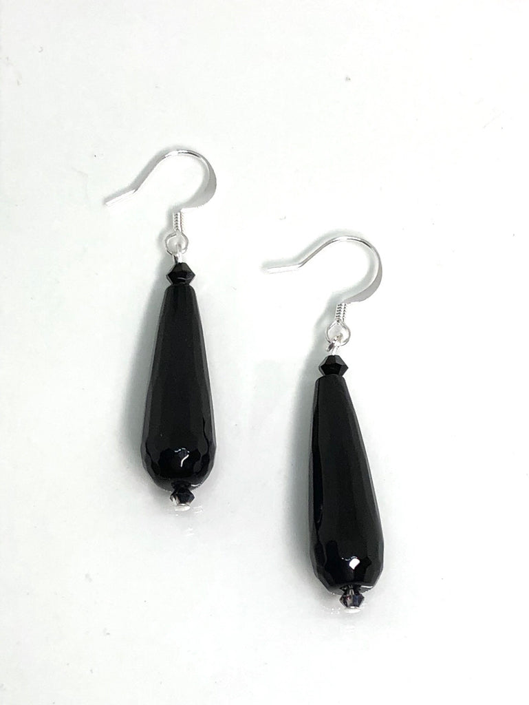 teardrop style statement earrings are made from natural stone 