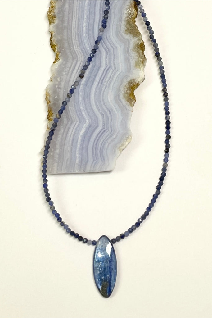 The Necklace Kyanite Gem Beads has a central pendant which is a hand cut and faceted from deep cobalt blue Kyanite shard.