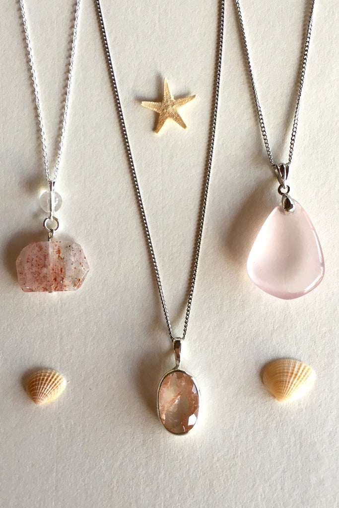 Pendant of Strawberry Quartz with Rock Crystal is unusual stone with flat cut and faceted to reveal all the lovely glittery inclusions hidden inside featuring 2.5cm to 3.5cm long total Each pendant drop.