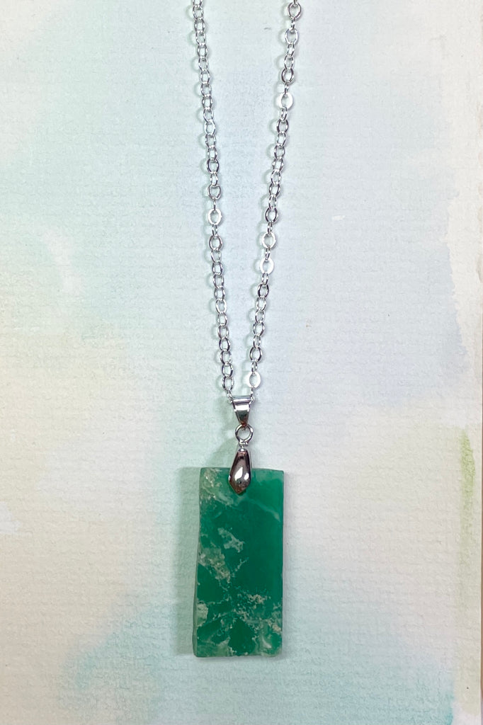 Chrysoprase in the raw, these rugged pendants were cut by a young local lapidarist to give a feel of the power of this gorgeous green stone.
