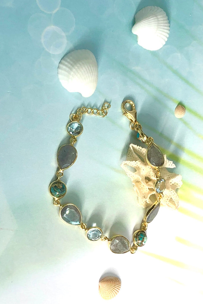 An ultra fine gold vermeil bracelet dotted with London blue Topaz, Labradorite and Turquoise composite.  