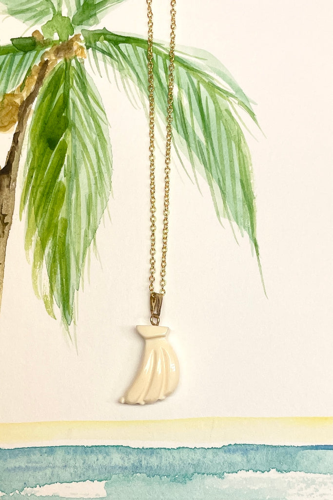 Rare pink conch shell hand carved into an island style. Comes on a gold vermeil chain