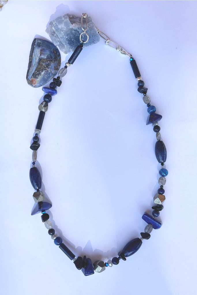 a sweet choker style hand made using an assortment of blue gemstones. These include Lapis Lazuli, Agate, Labradorite and natural Pyrite