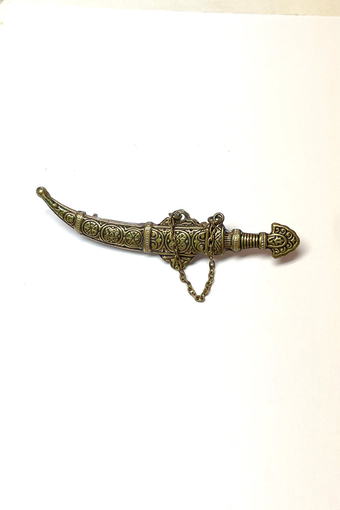 Vintage Damascene dagger and sheath brooch.