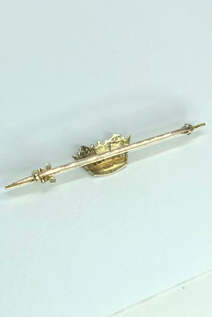 A Royal Navy & Merchant Services gold and pearl nautical crown sweetheart brooch, with 14 pearls set in 18 Carat gold,