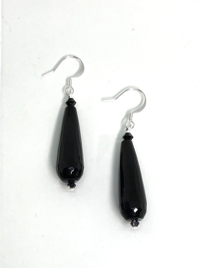 teardrop style statement earrings are made from natural stone 