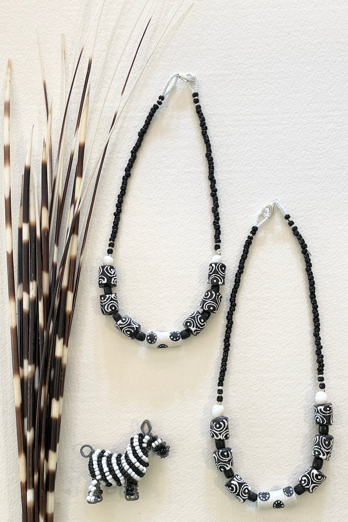 This necklace is from our exclusive range of jewellery highlighting the beautiful African recycled glass beads. The glass itself is derived from a variety of recycled sources including old beverage and medicine bottles.