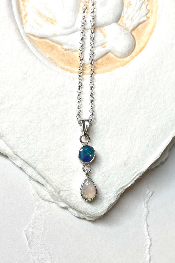 This lovely one off pendant featuring two lovely opal gemstones. Set in solid 925 silver.