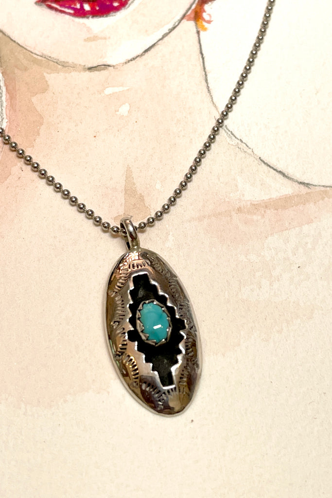 Choker length. Sterling silver centre pendant with a natural turquoise stone. Pendant is branded Moondance. Boho festival style jewellery. Comes on a silver tone chain. 