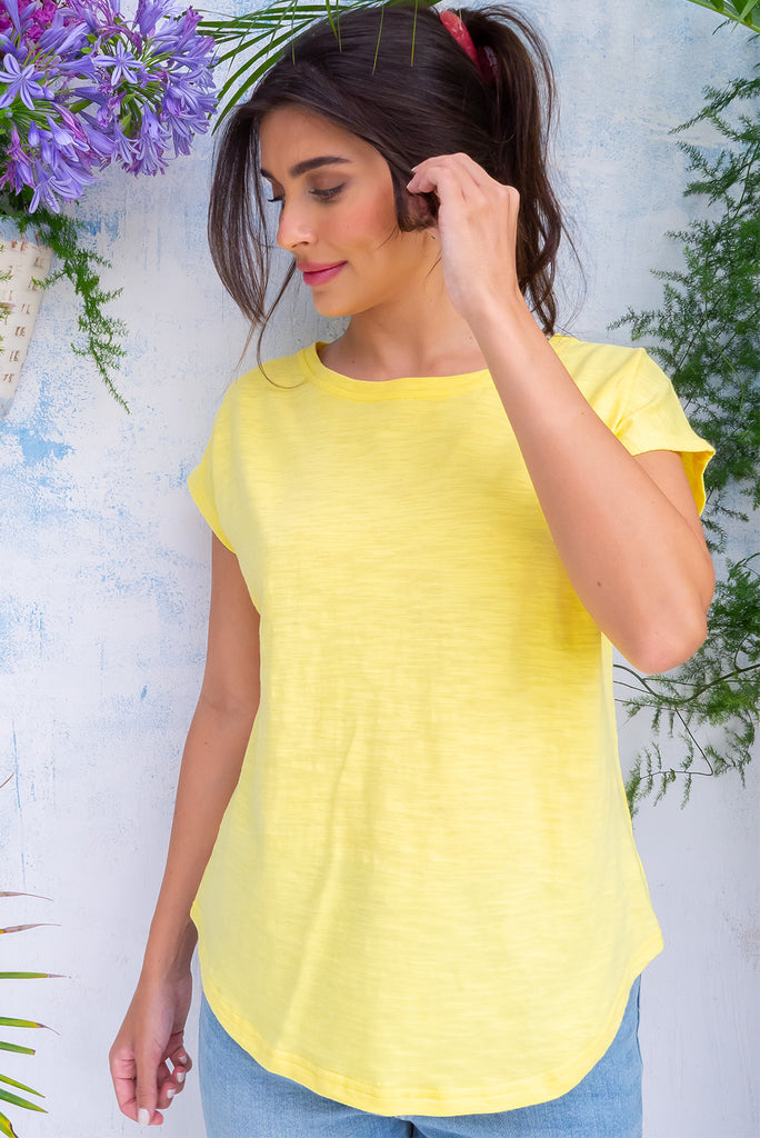 The Phoenix T-Shirt Sunflower is a gorgeous yellow coloured t-shirt, featuring a classic t-shirt cut, curved hem and loose fit. Made from 100% knit cotton.