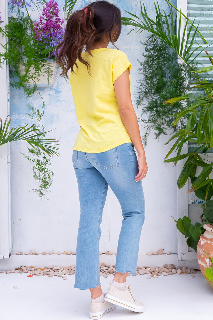 The Phoenix T-Shirt Sunflower is a gorgeous yellow coloured t-shirt, featuring a classic t-shirt cut, curved hem and loose fit. Made from 100% knit cotton.
